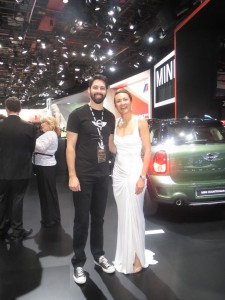 Vanessa Moriel (right) posing with a MINI Genious in front of his booth. BMW owned Mini unveiled the 2015 John Cooper Works Hardtop at the auto show. The new model is the most powerful Mini the company has produced to date.