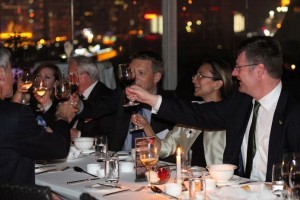 Dinner guests celebrate the evenign with a cheer! 