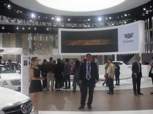 LIASE Group President and Managing Director Europe Wolfgang Doell standing in front of the Cadillac booth at the Shanghai Auto Show 2015. Cadillac unveiled a new Escalade as well as a hybrid version of its CT6 model. 