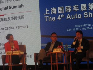 Dongfeng Motor Corporation Deputy Manager of the Strategy and Planning Departmen Wang Binbin speaking at the 4th Auto Shanghai Summit 2015. Dongfeng Motor unveiled a concept four-door coupe concept, the Venucia, at the Shanghai Auto Show. Venucia is a branch of the Dongfeng-Nissan joint-venture selling cars based on the Nissan Platform. Dongfeng also unveiled the Fengxing S500, a compact MPV; the Dongfeng Number 1, Dongfeng’s largest sedan ever; and the Fenshen AX3, a new compact crossover SUV.