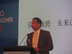 Tesla Motors Vice President for Communications Ricardo Reyes speaking at the 4th Shanghai Auto Summit 2015. 