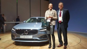 Vanessa Moriel, Managing Director Asia, Liase Group and John Bukowicz, Managing Director for the Americas, LIASE Group stand next to Volvo’s new S90. 