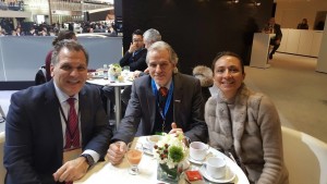 John Bukowicz, Managing Director for the Americas, LIASE Group, and Vanessa Moriel, Managing Director Asia, LIASE Group, pose with Thomas Heringer from Automobilwoche