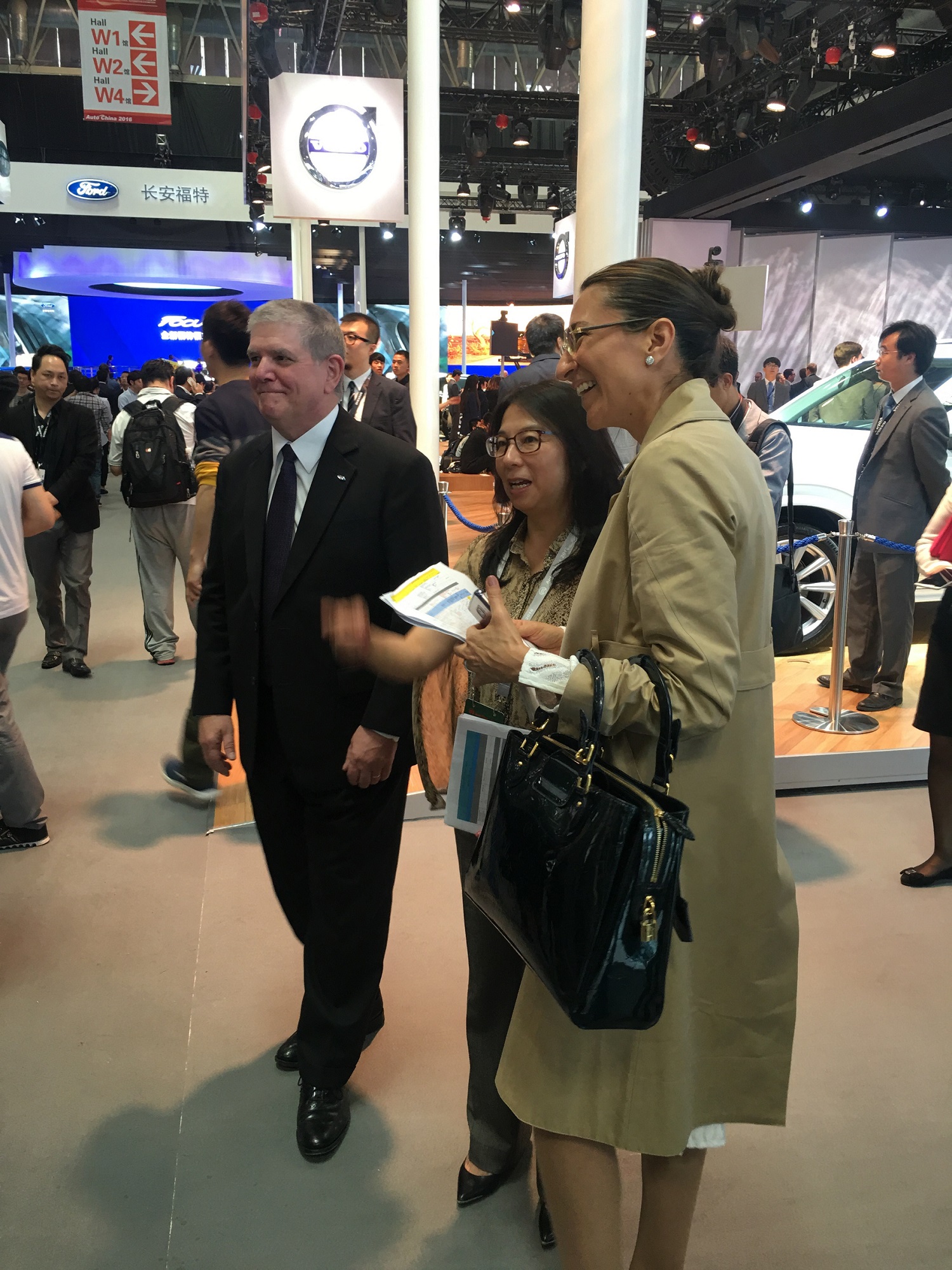 Vanessa Moriel (front) poses for a picture with Ford Asia President, David L. Schoch (back). 