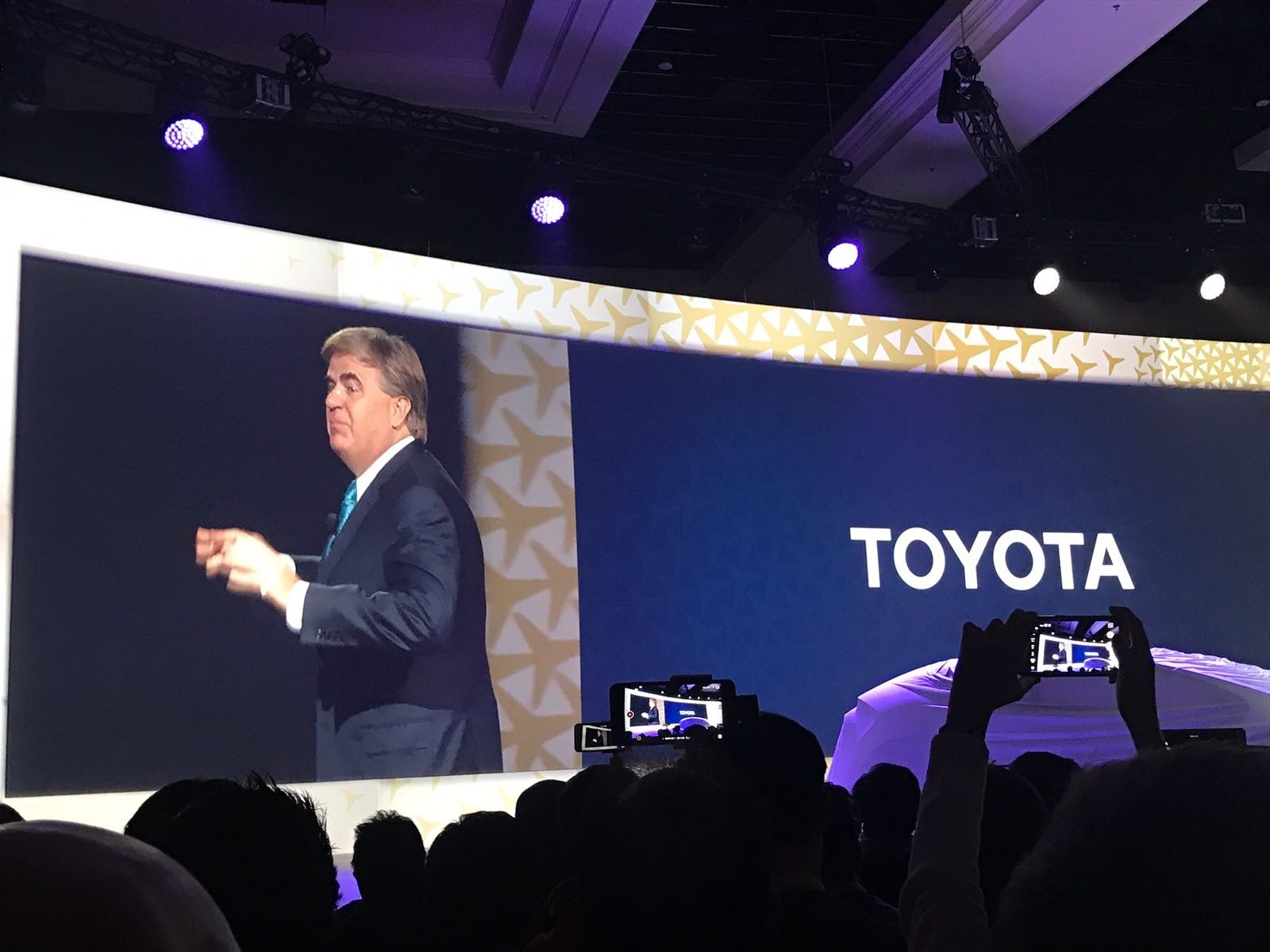Robert Carter, Senior Vice President – Automotive Operations at Toyota Motor Sales, U.S.A. Inc., presents during the reveal of the Toyota Concept-I, a fun twist on the driverless car concept. 