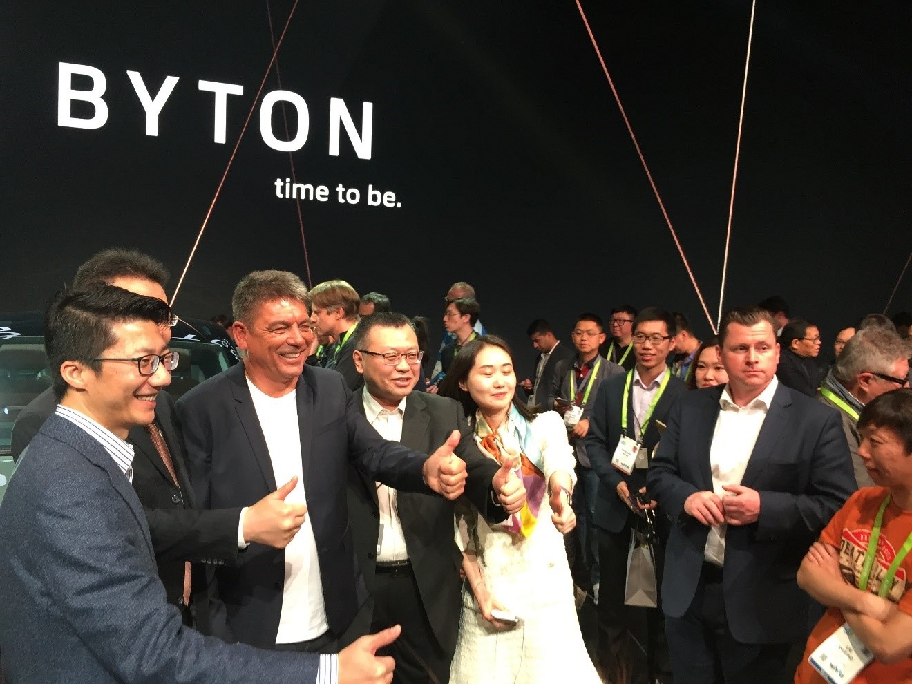 Dr. Carsten Breitfeld, CEO, Co-Founder and Chairman of the Board of Byton taking a picture with members of his team, including Ding Qingfen, Head of External Affairs, Public Relations and Government Affairs.