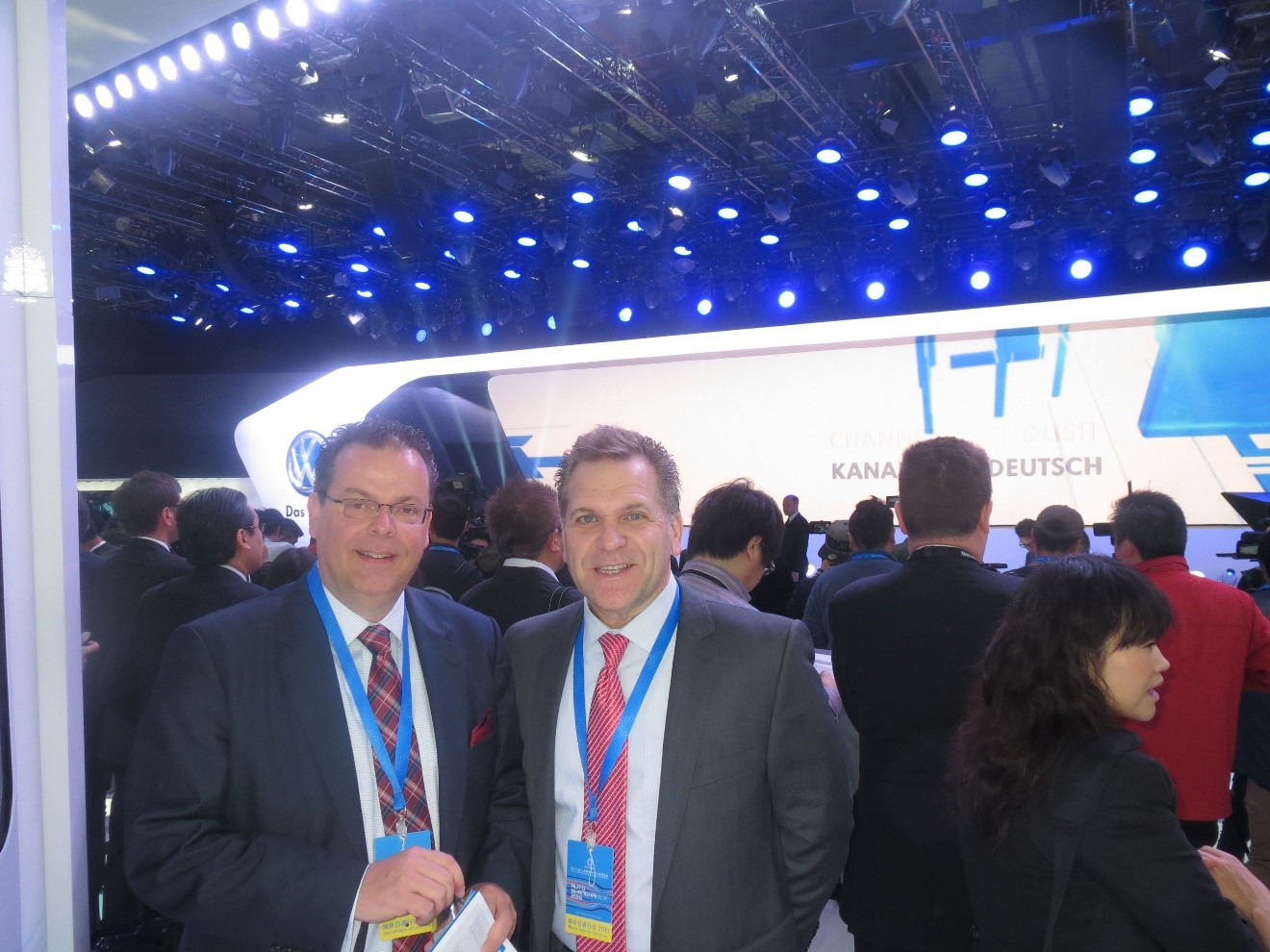 LIASE Group President and Managing Director Europe Wolfgang Doell (left) standing with LIASE Group Managing Director for the Americas John Bukowicz (right) in front of the Volkswagen stage at the 2015 Shanghai Auto Show.